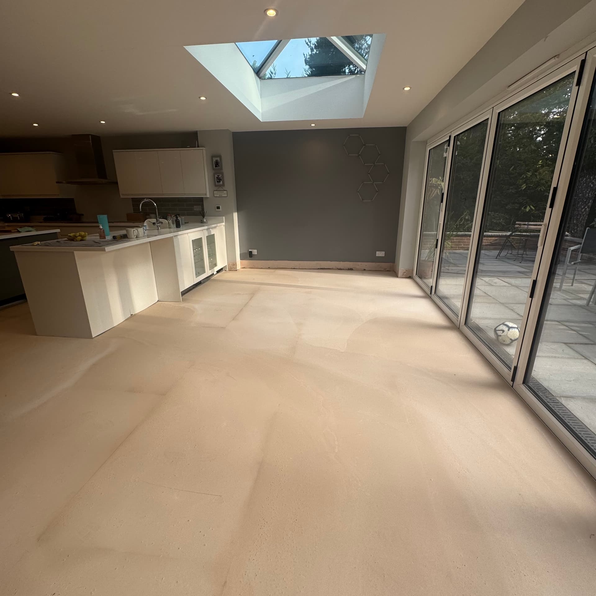 We've finished the latex and got a nice flat surface ready for tiling. Next up we'll prime the floor and set out the tiles diagonally, matching the garage conversion we tiled here a couple of years back.