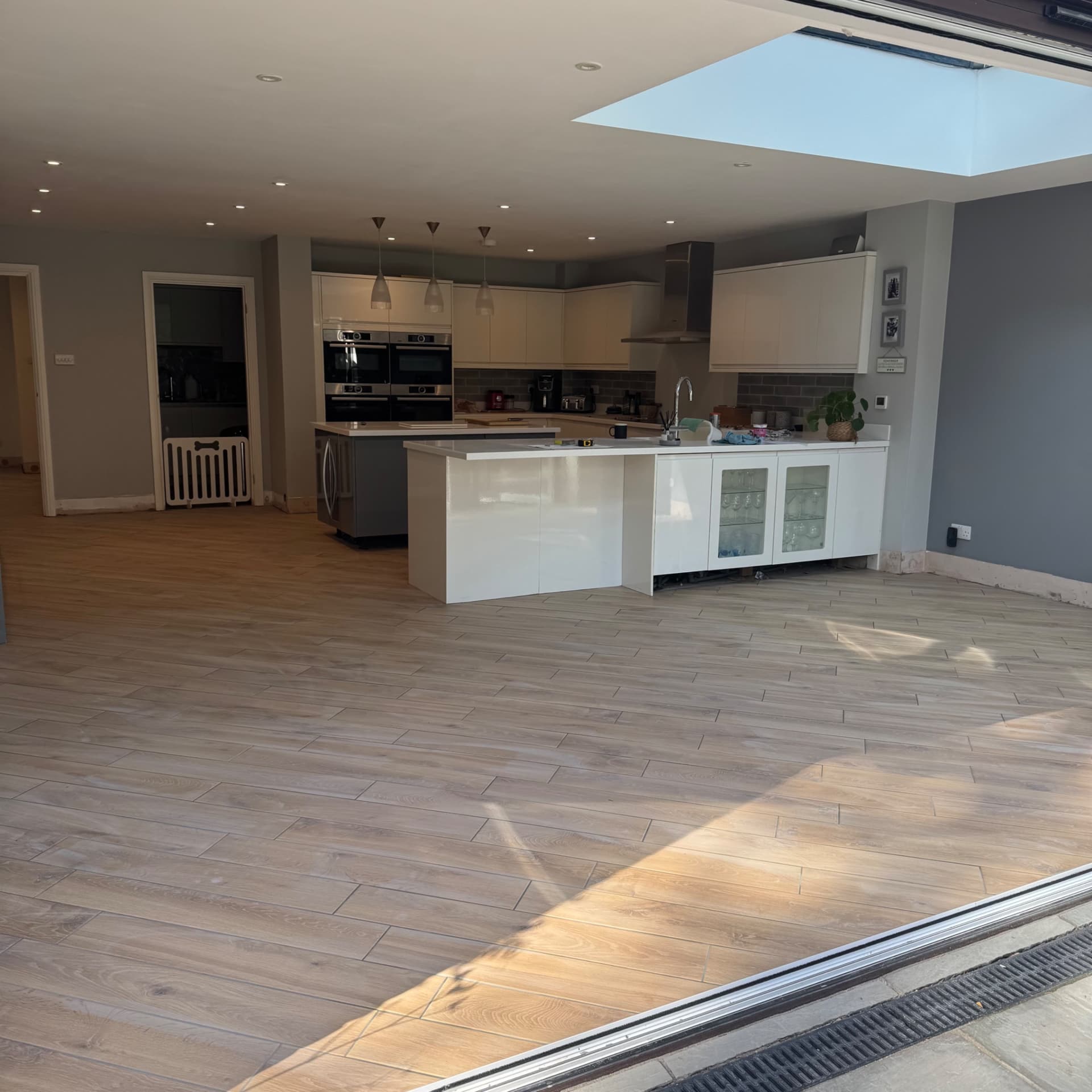 We've washed off the grout and the floor is looking clean with smooth joints throughout. There may be a bit of smearing at this stage, but once it's fully dried a quick mop will bring it up perfectly. We're delighted with how it's turned out, and most importantly so is the customer.